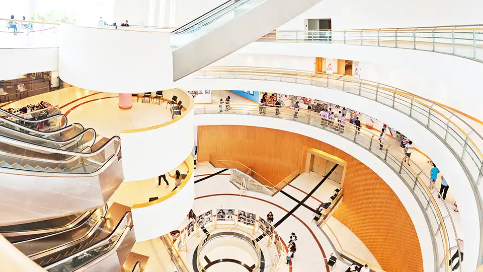 Bright atrium and layered walkways at BACC, where architecture meets accessible culture.