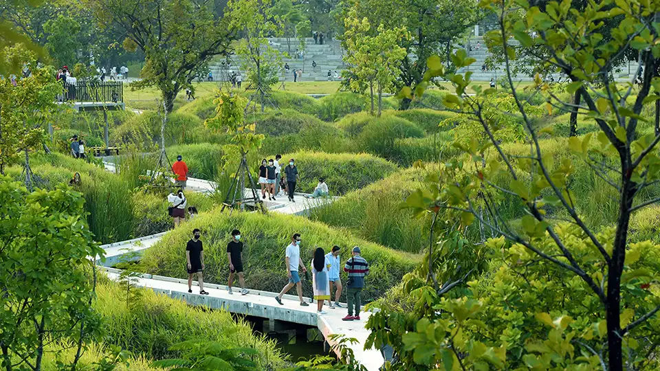 Peaceful walkways and natural landscapes make Benjakitti Park a quiet break from city life.