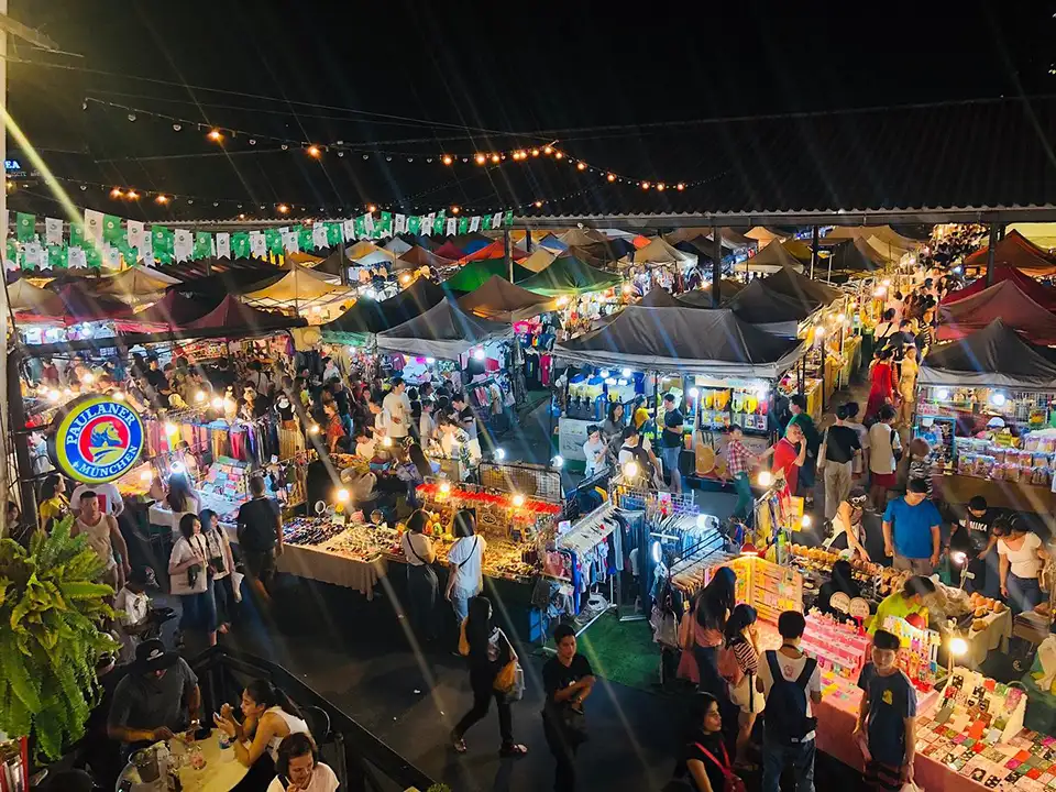 Bright lights and busy aisles at Train Night Market Srinakarin, Bangkok’s retro shopping hotspot.