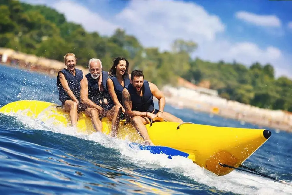 Exciting banana boat ride creating unforgettable beach memories with family and friends