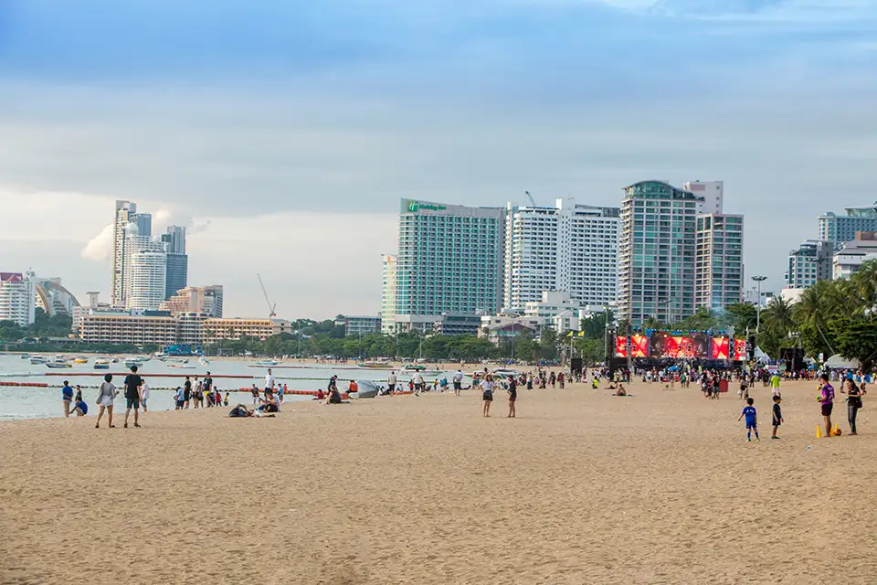 Free fun at Pattaya Beach - families and visitors enjoying the public beach
