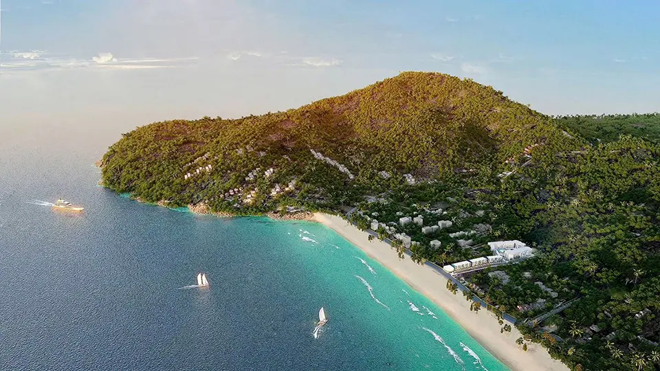 Hidden Beaches in Phuket: Aerial view of Nai Thon Beach, Phuket with turquoise waters, white sand, and lush green hills.